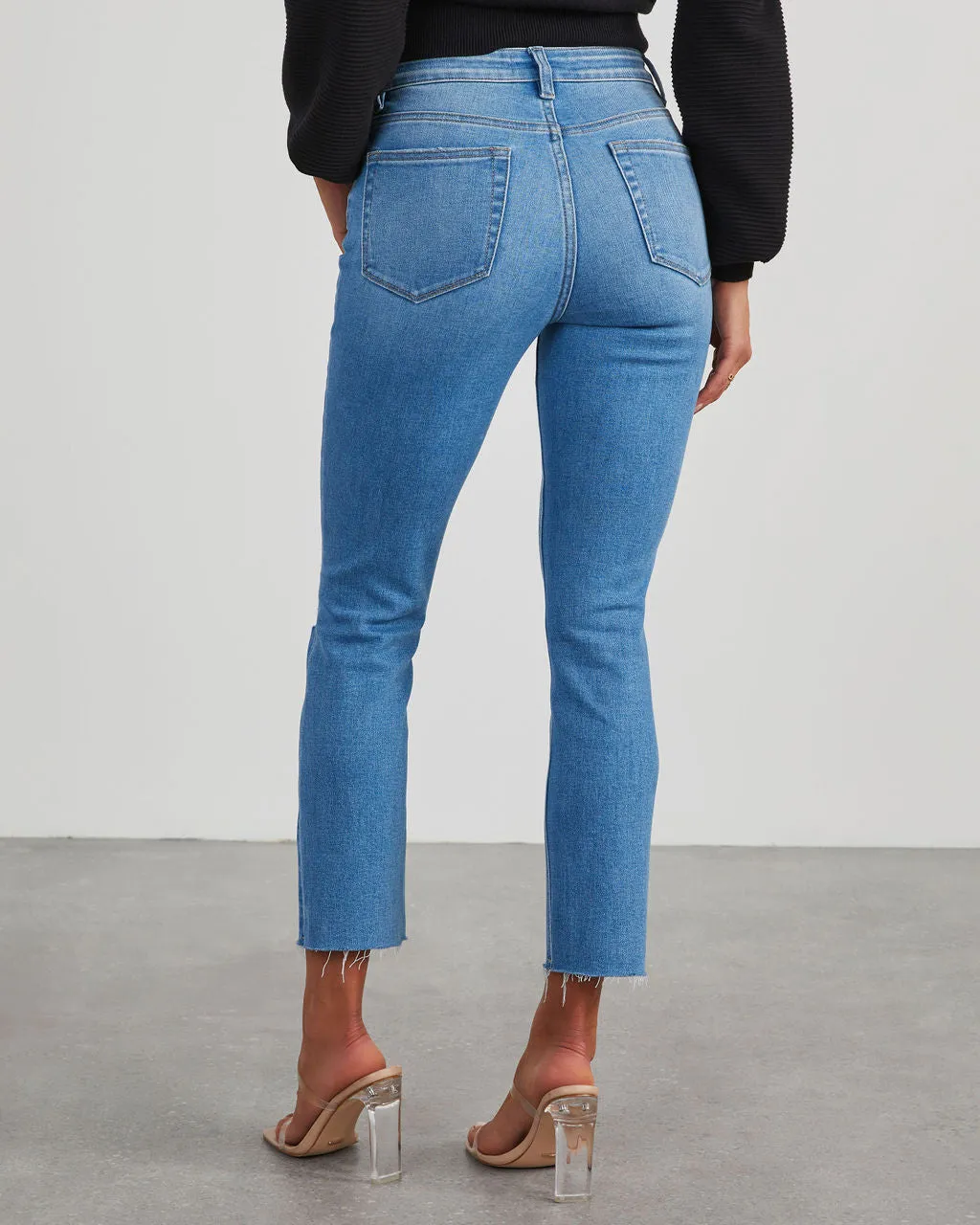 Jeanne High Rise Distressed Slim Straight Denim