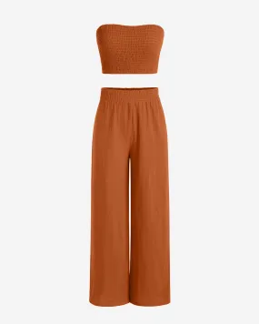 Smocked Strapless Top & High Waisted Wide Leg Pants Set In Rust Orange